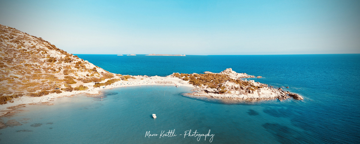 Aerial panorama of the cove at Spiaggia di Punta Molentis